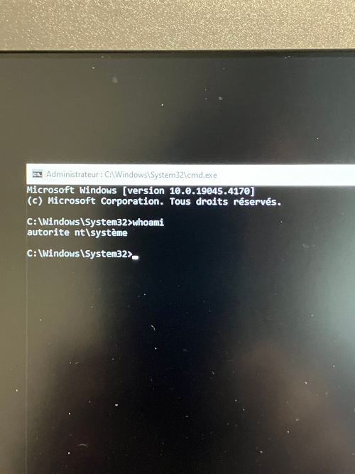 Command prompt running under SYSTEM authority.